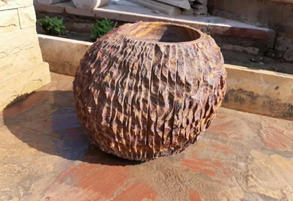 Stone And Teakwood Flower